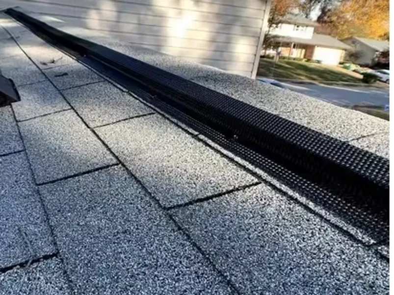 rs=w_800,h_602,cg_true,m A gutter that is being installed on the roof of a house.
